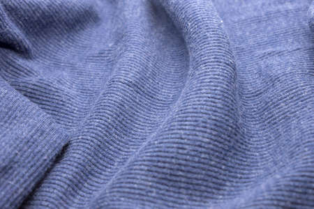 This is a photograph of textured Blue fabric background