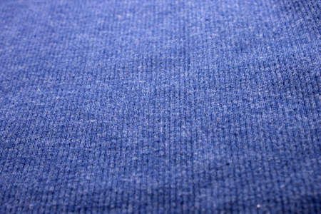 This is a photograph of textured Blue fabric background