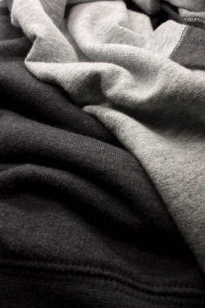 This is a photograph of Dark and Light Gray fabric backgroundの写真素材