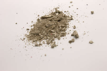 This is a photograph of a Green powder Eyeshadow isolated on a White backgroundの写真素材