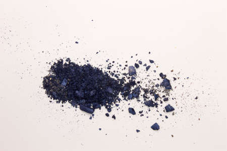This is a photograph of Shimmery Royal Blue powder Eyeshadow isolated on a White backgroundの写真素材
