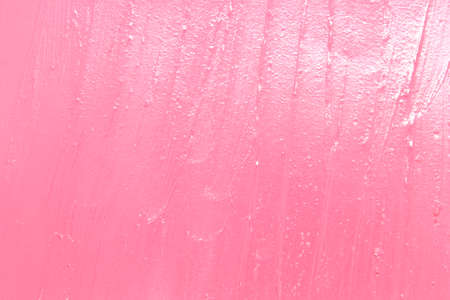 This is a photograph of a Metallic Light Pastel Pink Lipstick swatch background