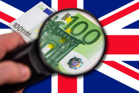 Banknote under close investigation. Concept illustrating financial relations.