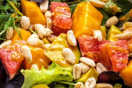 Healthy salad with mango grapefruit and avokado for light and nutricios breakfast 