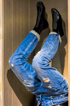 Shabby blue jeans isolated
