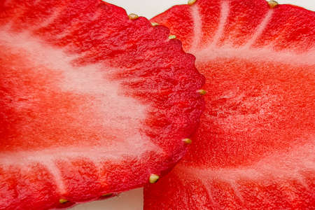 Homemade cheesecake decorated with strawberries. Fresh red berries closeup