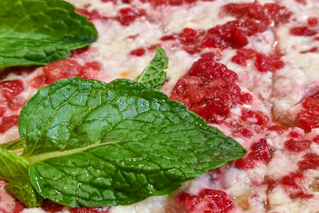 Sweet pizza for kids with mint and rasberries