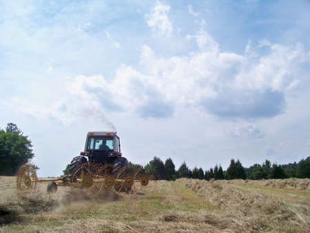 a  hay  rake  at  workの写真素材