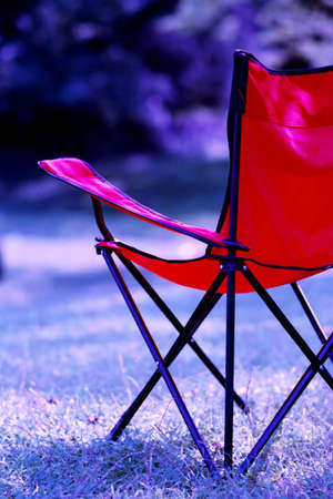 waiting chair on grassの写真素材