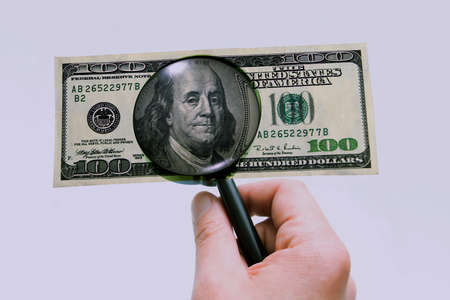 money under eye glass searchの写真素材