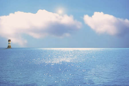 light house on the sea and blue ripples of the waterの写真素材