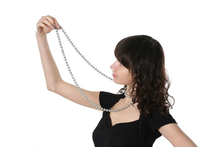 Portrait of the beautiful woman with a pearl necklaceの写真素材