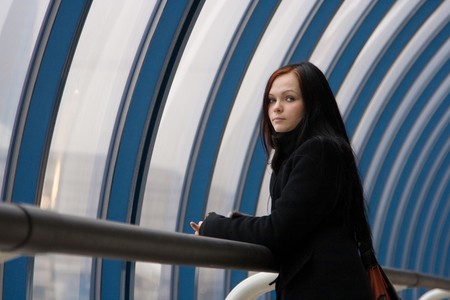Portrait of the young sad woman with black hairの写真素材