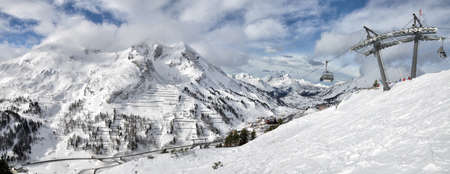 Winter shot of the mountain ski resort Obertauern in the Austrian Alpsの写真素材