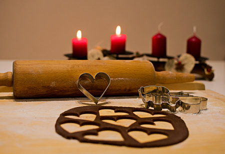 Christmas time in the kitchen: homemade gingerbread cookies, decorations, Advent candlesの写真素材