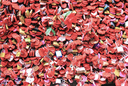 Red heart padlocks in Veronaの写真素材