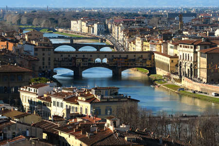 Ponte Vecchio over the Arno River in Florence, Tuscany Italyの写真素材