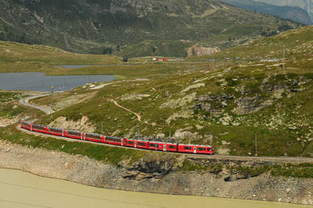 Swiss railwayways - Swiss mountain train Bernina Express crossed the Alpsのeditorial素材