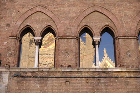Piazza del Campo and Palazzo Sansedoni, Tuscany, Italy.の写真素材
