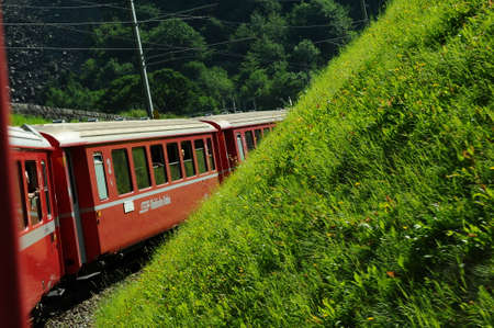 Switzerland: July 2012, Swiss Mountain Train Bernina Express from Tirano to St. Moritz - unesco heritageのeditorial素材