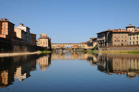 15 August 2017: Panorama view of the famous Old Bridge (Ponte Vecchio) as seen from under the Bridge. Florence, Italy.のeditorial素材
