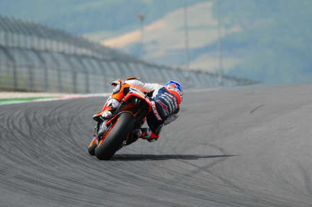 MUGELLO - JULY 13: Casey Stoner of Repsol Honda team races at Qualifying Session of Moto GP Grand Prix of Italy on July 13, 2012 in Mugello Circuit, Italy.のeditorial素材