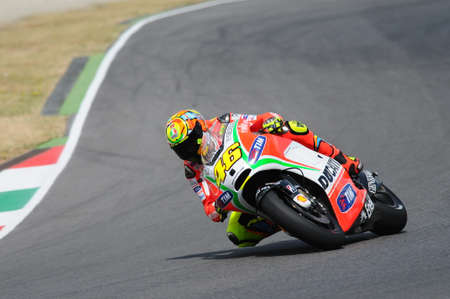 MUGELLO - ITALY, JULY 13 2012: Italian Ducati rider Valentino Rossi during 2012 TIM MotoGP GP of Italy.のeditorial素材