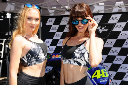 MUGELLO, IT, June 3: Unidentified Grid Girls poses for photos in the paddock during MotoGP GP of Italy 2017 at the Mugello Circuit in Italyのeditorial素材