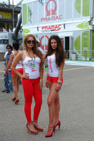 MUGELLO - JUNE 2010: Grid girls at 2010 TIM GP of Italy MotoGP on June 2010 in Mugello Circuit in ITALY.のeditorial素材