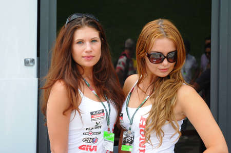 MUGELLO - JUNE 2010: Grid girls at 2010 TIM GP of Italy MotoGP on June 2010 in Mugello Circuit in ITALY.のeditorial素材