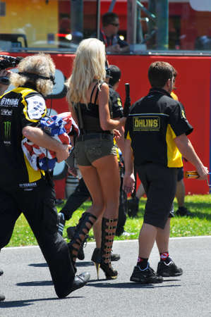 MUGELLO - JUNE 2010: Grid girls at 2010 TIM GP of Italy MotoGP on June 2010 in Mugello Circuit in ITALY.のeditorial素材
