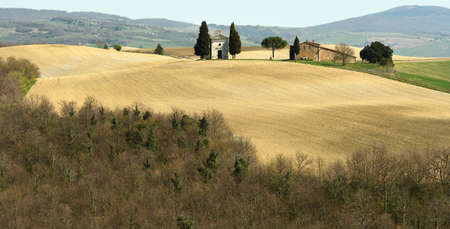 Beautiful tuscany landscape, little chapel of Madonna di Vitaleta, Pienza, Siena, Italy.の写真素材