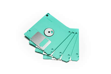 old colored computer floppy disks isolated on white