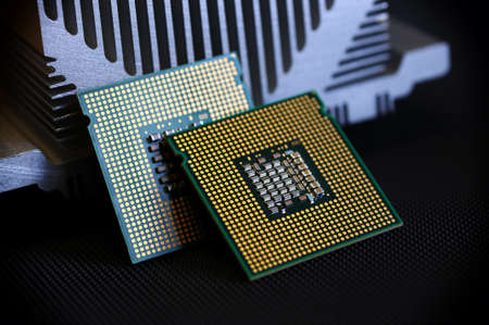 closeup of cpu chips on aluminum heat sink cooler