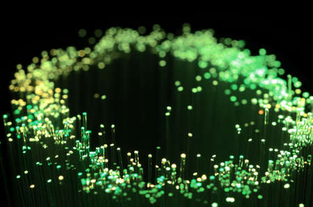 green colored fiber optic abstract background.の写真素材
