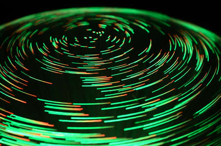 colored vortex effect created by fiber light source. abstract backgroundの写真素材