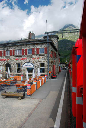 Switzerland, July 2012: Alp Grum Station of the famous red alpine train Bernina Express in Switzerland.のeditorial素材