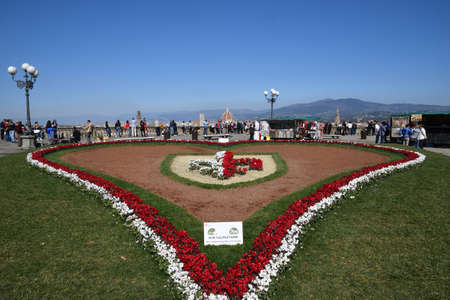 Florence, March 23, 2019: the 'love' flowery installation at Piazzale Michelangelo for Valentine's Day 2019 with Cathedral of Santa Maria del Fiore on background. italyのeditorial素材