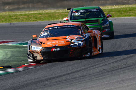 Italy - 29 March, 2019: Audi R8 LMS 2019 of Car Collection Motorsport Germany Team driven by Dimitri Parhofer/Rik Breukers/Markus Pommer/Toni FornÃ© in action during 12h Hankook Race at Mugello Circuit.のeditorial素材
