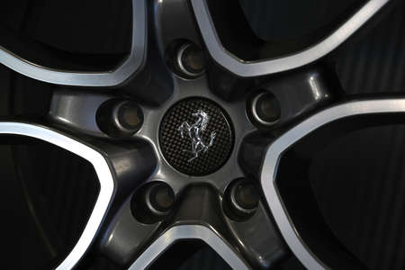 MUGELLO, IT, 24 October 2019: detail of an alloy wheel of a Ferrari sports car on display in the...