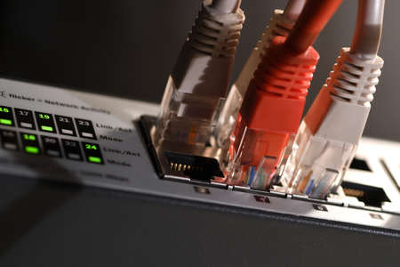 Detail of RJ45 Lan Cables and lights on network switches. Macro Shotの写真素材