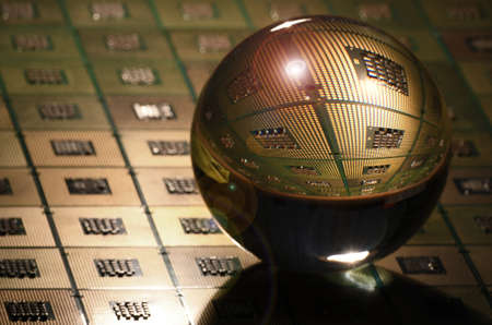 Detail of Computer CPU Chip reflected in to a crystal lensball. abstract background. tecnology background.の写真素材