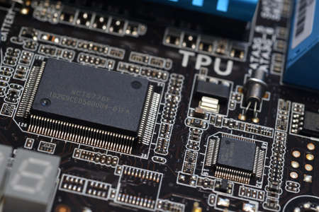 detail of electronic components over computer mainboard