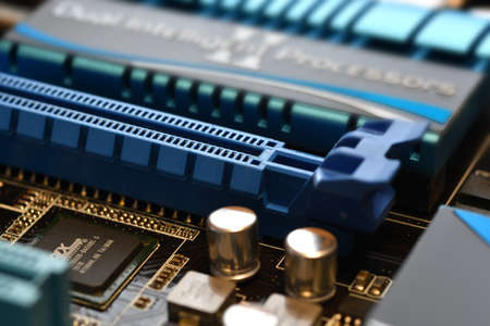 Motherboard with blue PCI-express slot, close-up and selective focusing