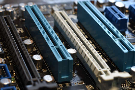 Electronics Components on a Modern PC Computer Motherboard with PCI-Express slot.の写真素材