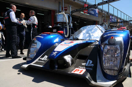Imola, Italy 3 July 2011: Peugeot 908 HDI Fap 2011 LMP1 of Team Peugeot Sport Total driven by Anthony Davidson and Sebastien Bourdais in action during Race 6H ILMC at Imola Circuit.のeditorial素材