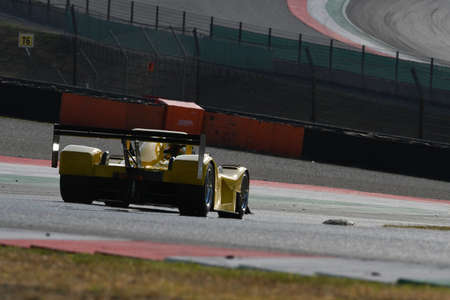 Scarperia, Mugello - 28 August 2020: Historic yellow Prototype Ferrari 333SP in action at the Mugello Circuit during Ferrari Racing Days in italy.のeditorial素材