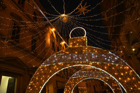 Florence, 23 November 2020: Christmas decoration in the center of Florence. Via Tornabuoni, the fashion street in the historic center of Florence. Italy.のeditorial素材