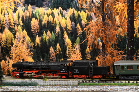Florence, ITALY - October 2020: Miniature railway model with trains. Mountains ambientation.のeditorial素材