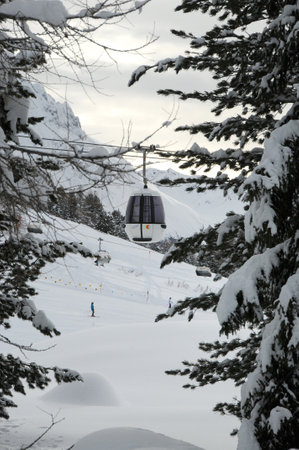 Canazei, February 2014: Winter season, cable cars on the slopes of the Sella Ronda near Canazei, Val di Fassa. South Tirol in Italy.のeditorial素材